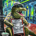 A colorful painted artwork of an alligator dressed in a hat, sunglasses, and patterned shirt sitting at a table with a sign that reads 'I DON'T BITE,' with a street sign reading 'Bourbon St.' in the background.