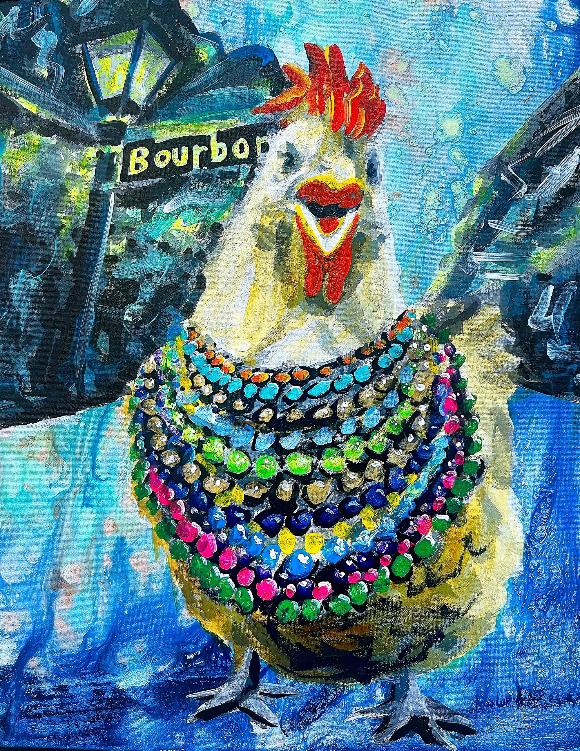A painted white chicken with a red comb wearing colorful Mardi Gras beads on Bourbon Street in New Orleans