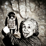 A painting of Albert Einstein sticking his tongue out beside a Banksy style graffiti sign of a monkey